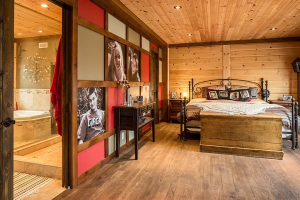 Timber Block master bedroom with bath and wall 